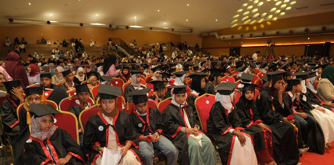 Full convocation hall with graduates